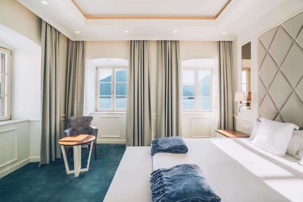 Hotel room with windows overlooking sea