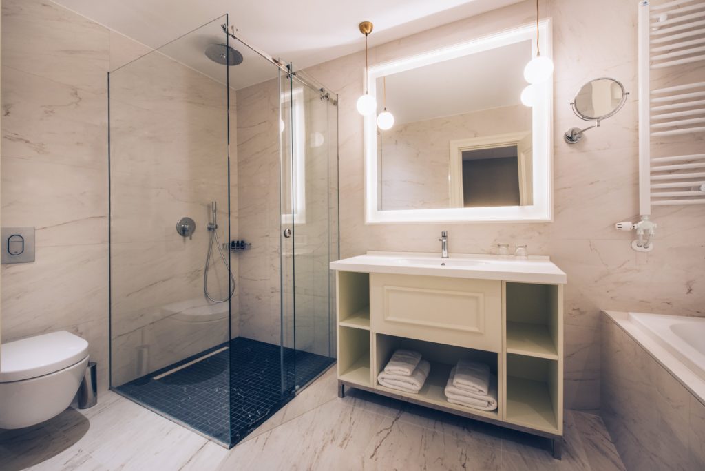 Hotel bathroom - shower, sink area and mirror